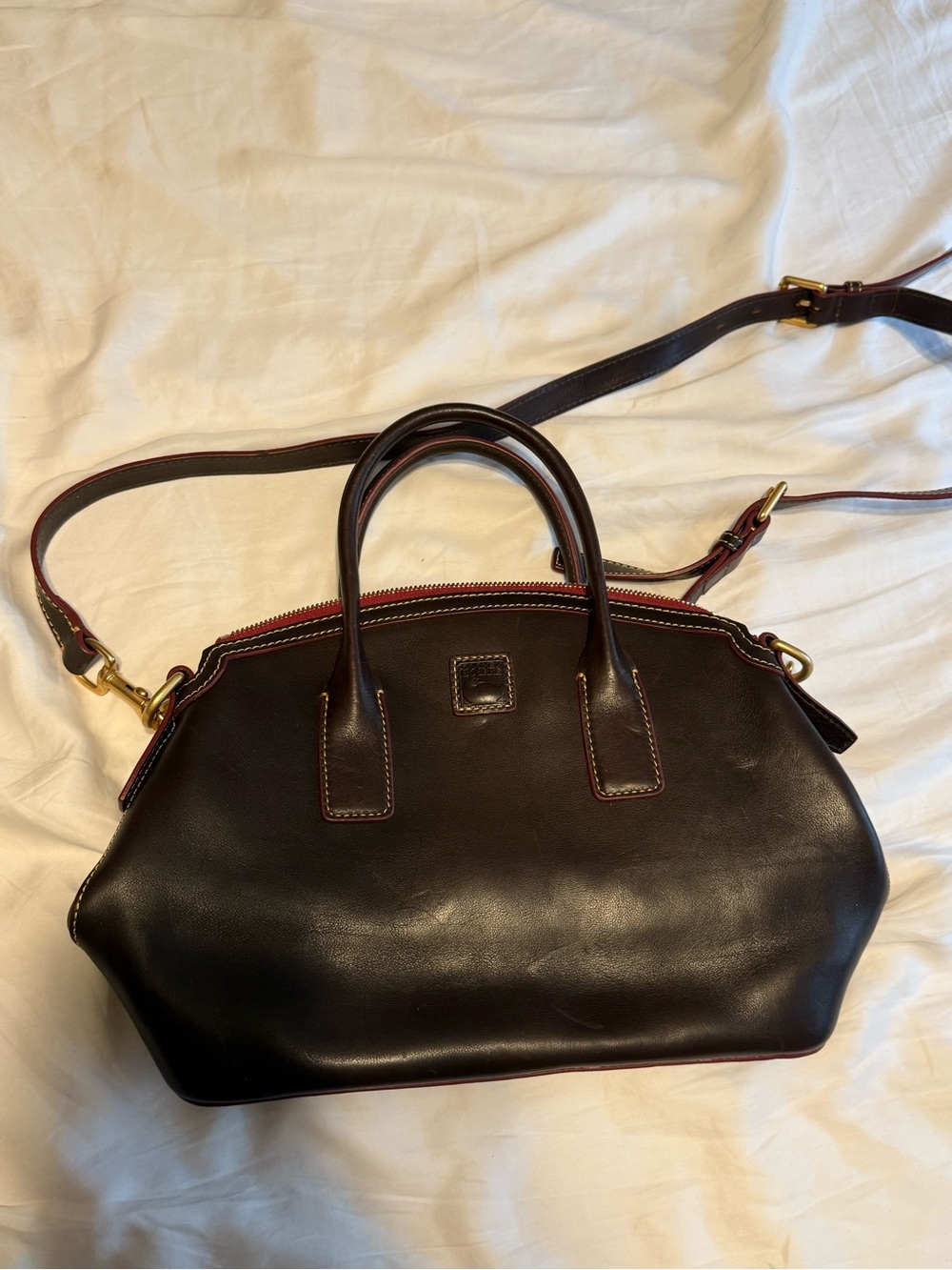 Dooney & Bourke Black Leather Satchel with Red Trim